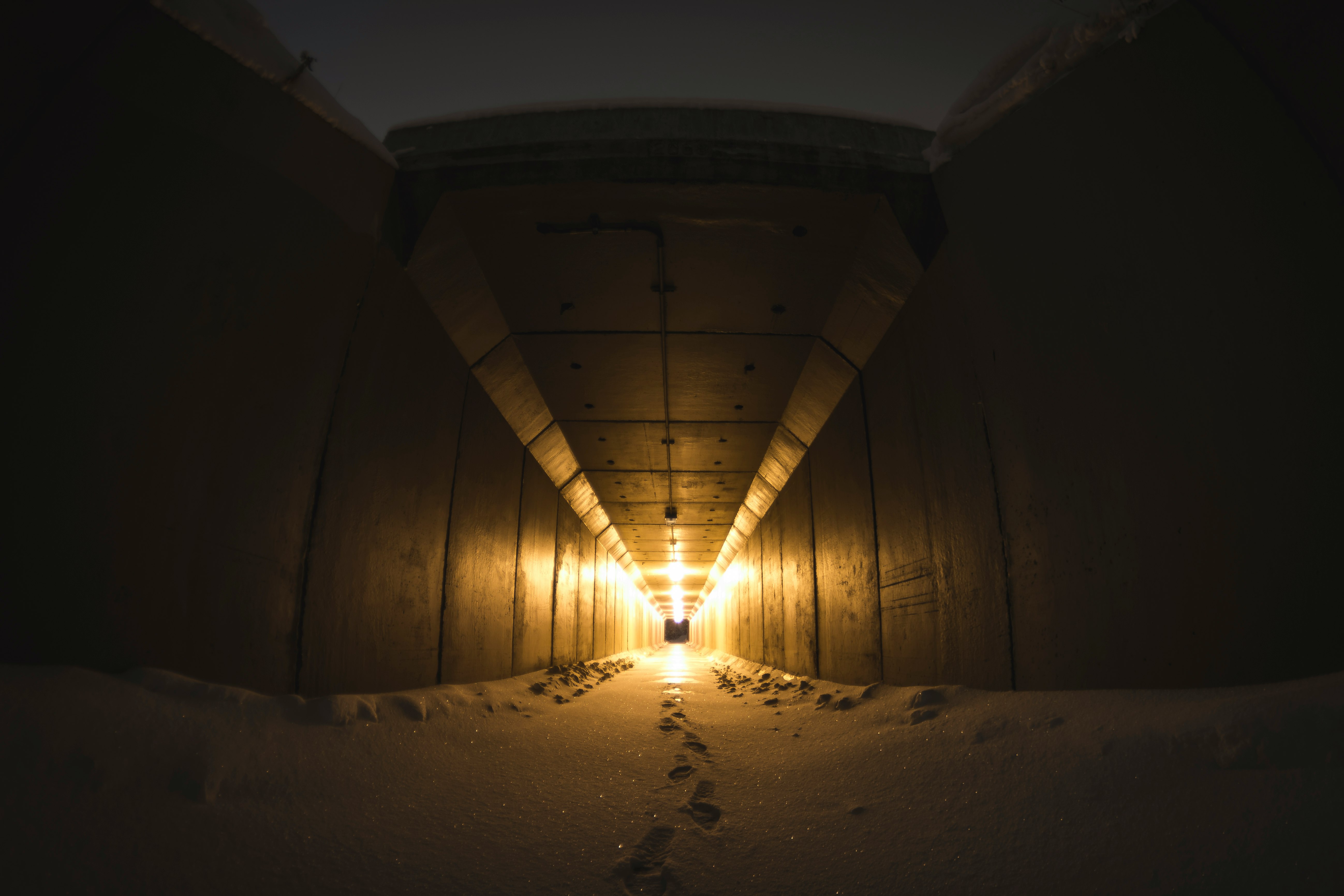 sand on hallway with yellow light